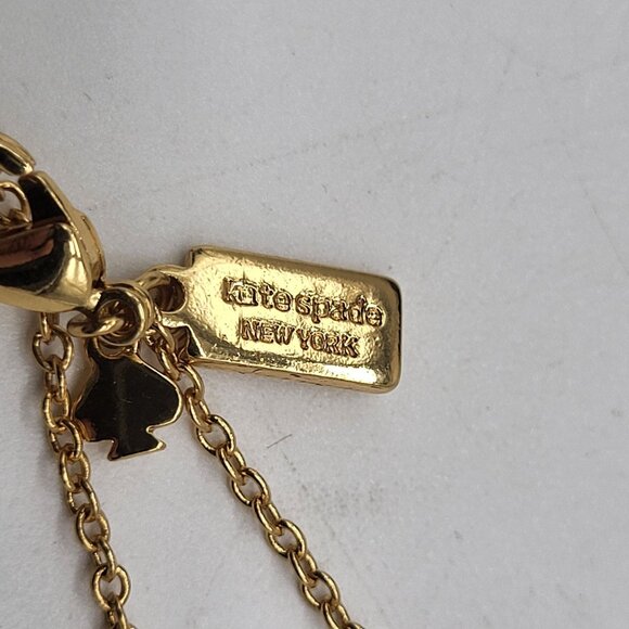 Kate Spade New York Hole Punch Cut out Gold Tone Long Necklace - Picture 8 of 12